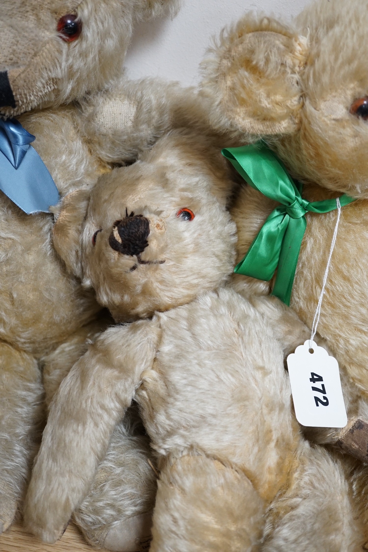 Three mid 20th century teddy bears including one Chad Valley and one Merrythought